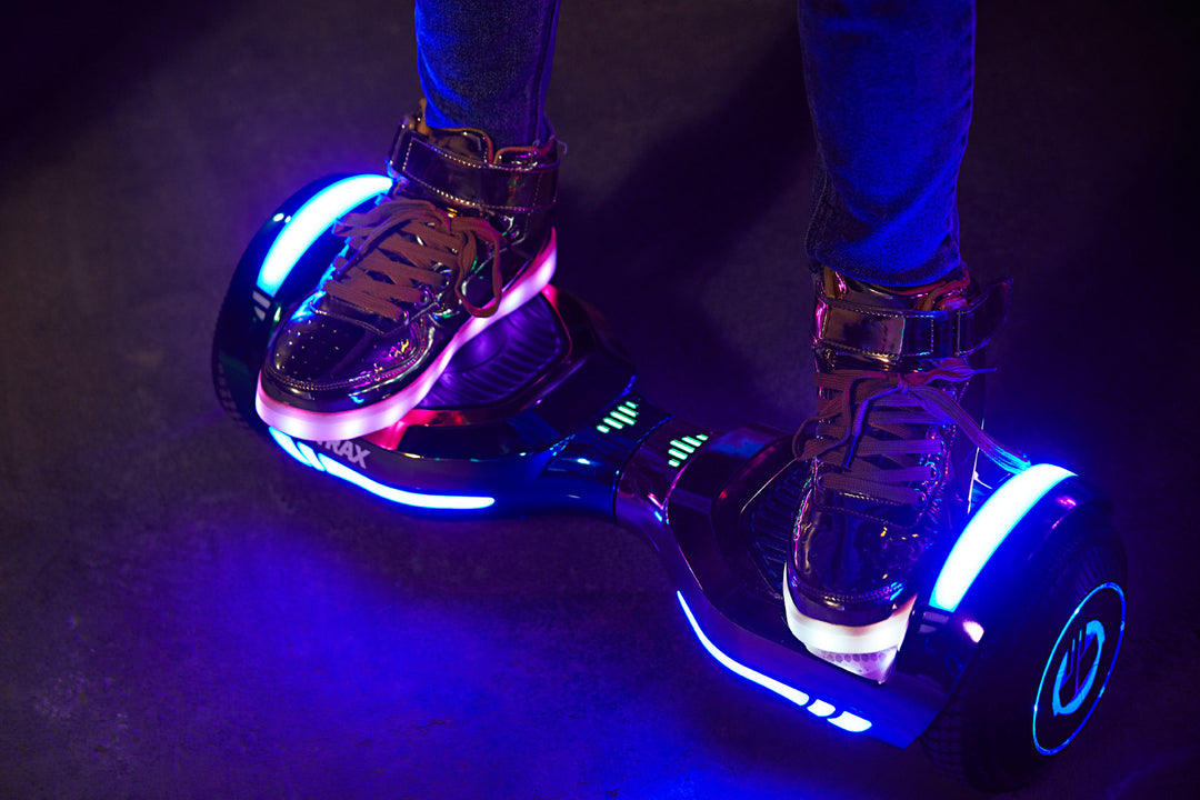 Child riding GOTRAX Glide Chrome Bluetooth LED Hoverboard for Kids